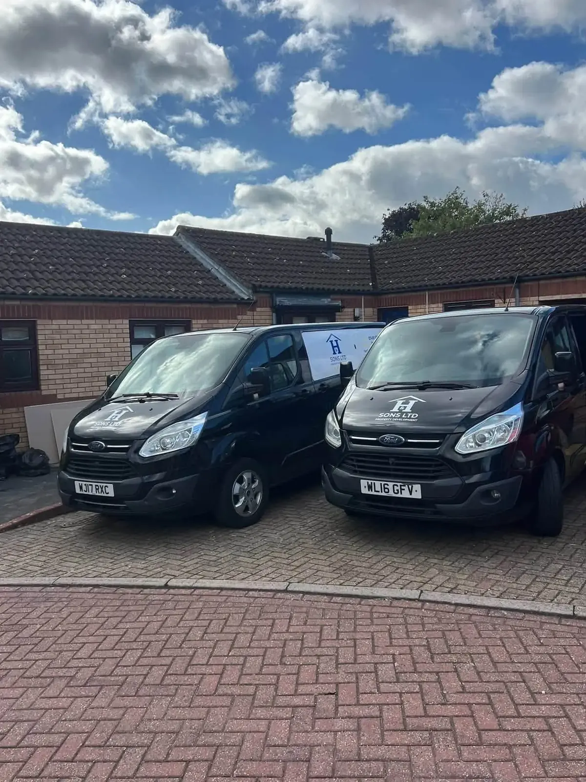 Hardy and Sons branded vans ready for local property work