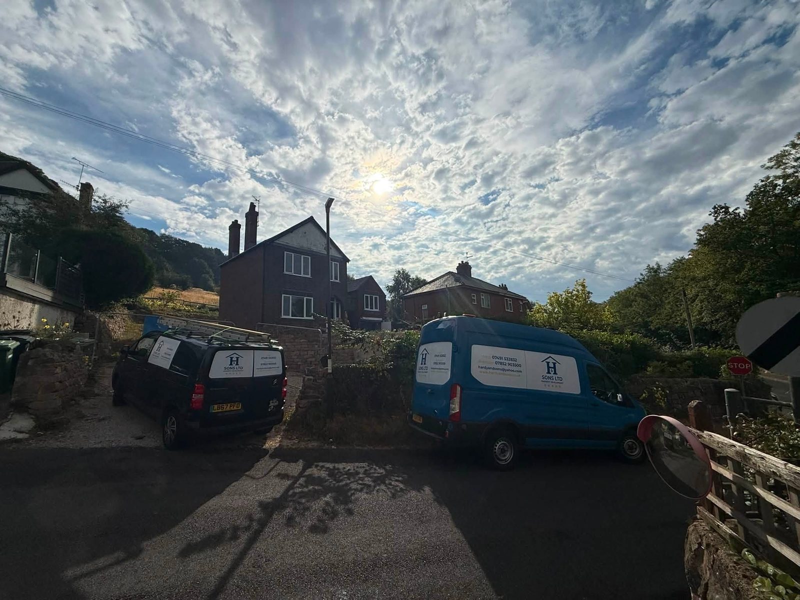 Hardy and Sons Matlock property project with company vans outside the site