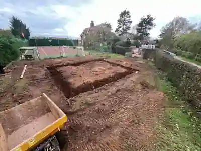 Site excavation and foundation trenches for the brick garage build by Hardy and Sons