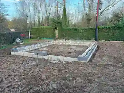 Foundation blockwork started for the brick garage build by Hardy and Sons