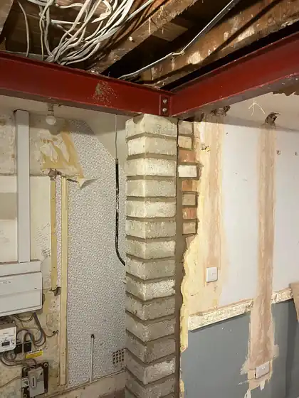 New steel beam connection supported on a blockwork pier