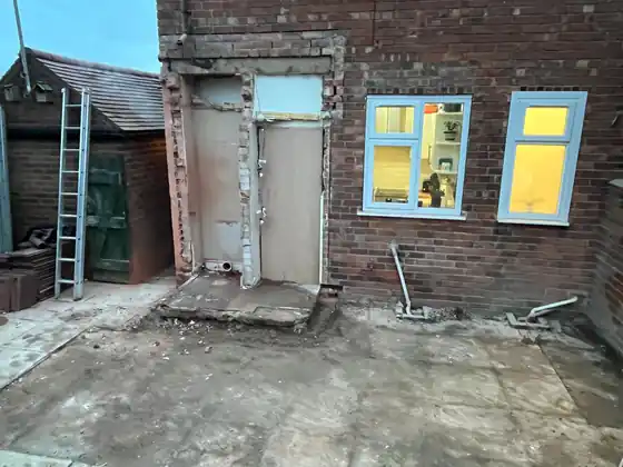 Rear of the home prepared for the new kitchen extension by Hardy and Sons