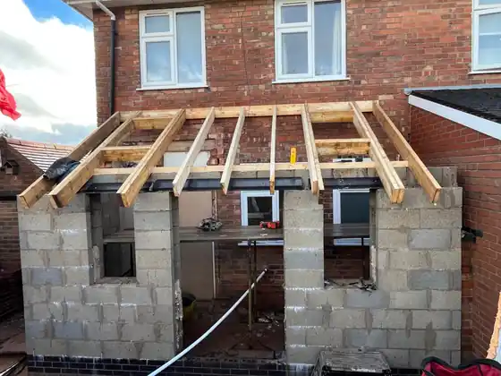 Timber roof rafters installed on the kitchen extension