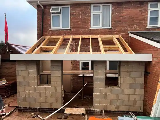 Kitchen extension roof structure and front roofline in progress