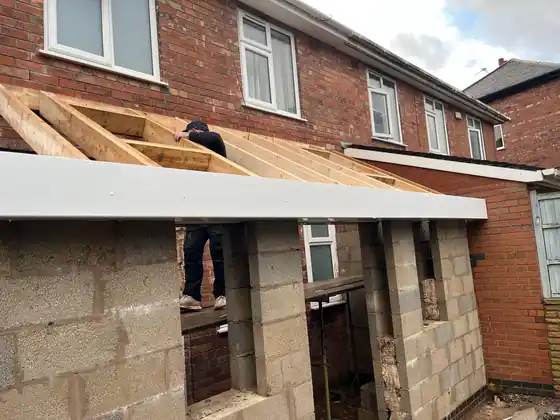 Roof framing being completed on the rear kitchen extension
