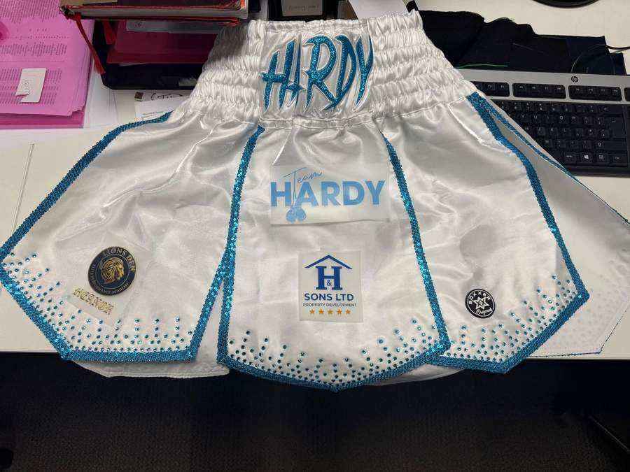 Team Hardy boxing shorts showing Hardy and Sons sponsorship branding